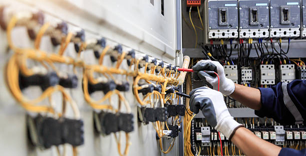 Professional Electrician technician working in Potomac Mills, VA